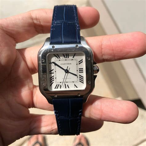 cartier santos on leather strap.